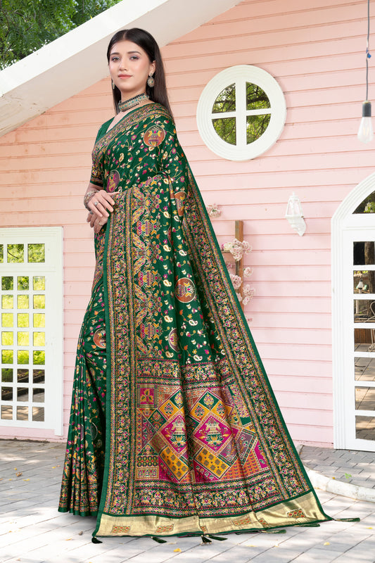 Royal Charm in Silk – Dark Green Saree with Patola-Style Grandeur